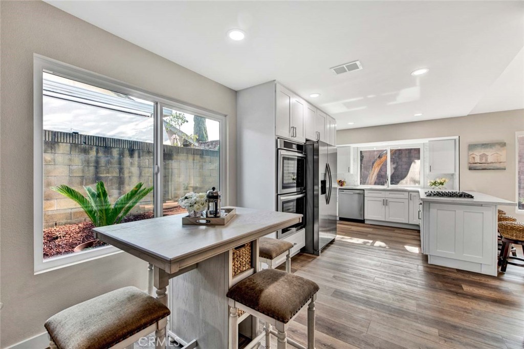 1798 Moorpark Drive Brea, CA 92821 - Photo 10 of 71 a kitchen with a table and chairs