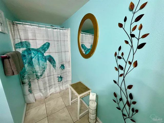 a vase of flowers sitting on a table