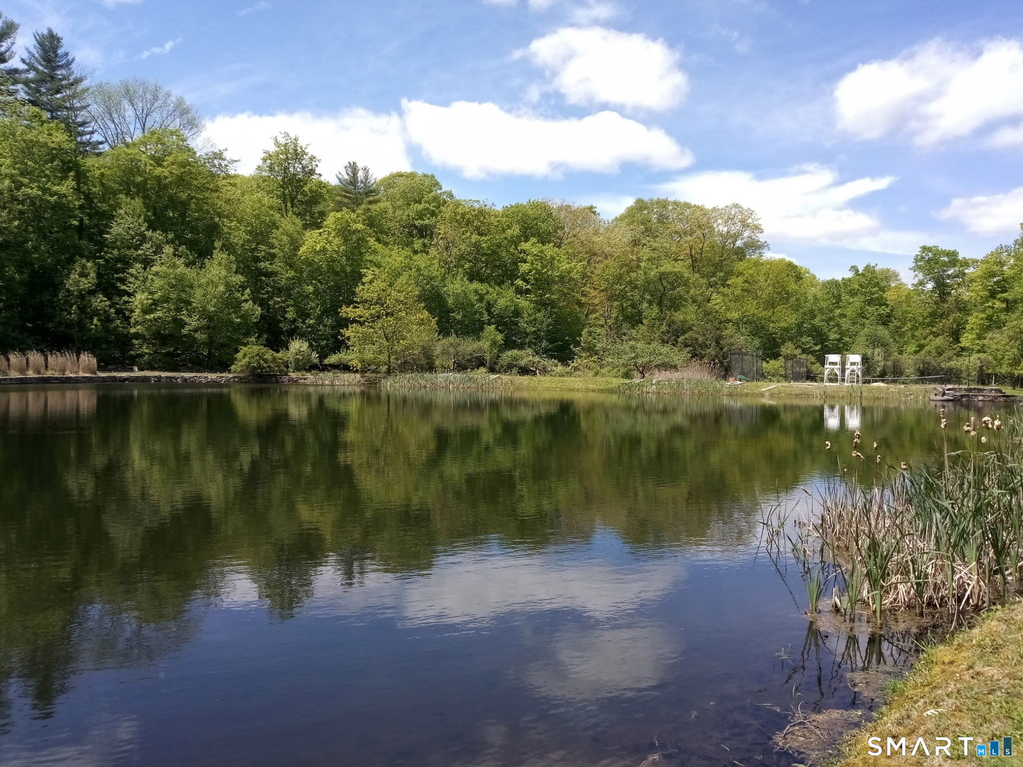 40 Looking Glass Hill Road Litchfield, CT 06750 - Photo 4 of 39 a view of a lake with a city