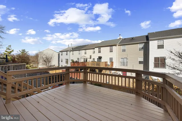 a view of balcony with wooden floor