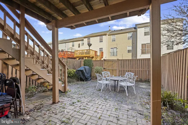 a view of a porch with furniture