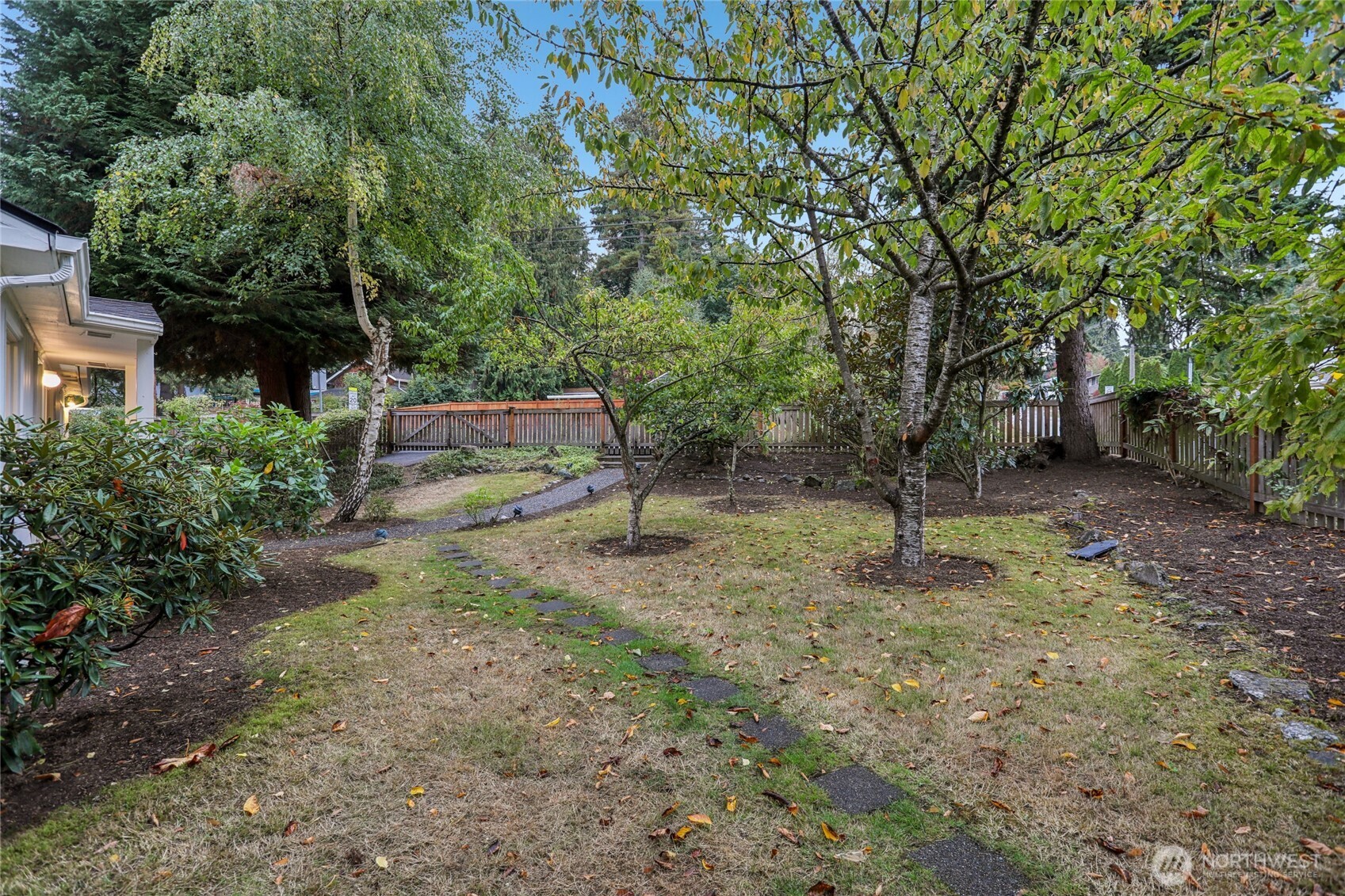 1005 Northeast 170th Street Shoreline, WA 98155 - Photo 27 of 35 a backyard of a house with lots of green space
