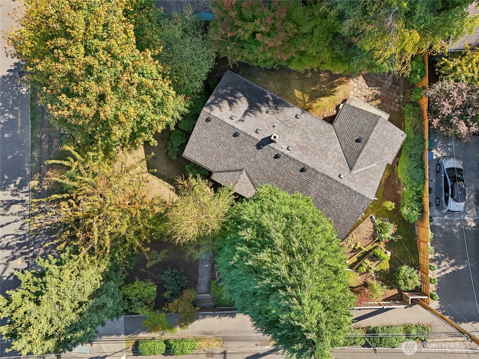 1005 Northeast 170th Street Shoreline, WA 98155 - Photo 32 of 35 an aerial view of a house with a yard and garden