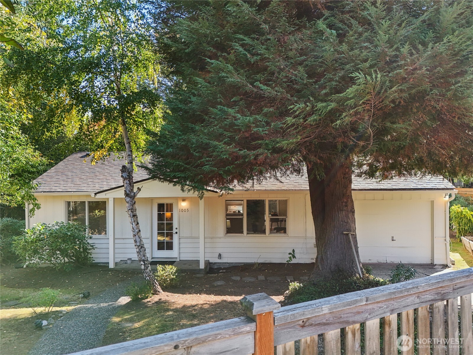 1005 Northeast 170th Street Shoreline, WA 98155 - Photo 34 of 35 a front view of a house with garden