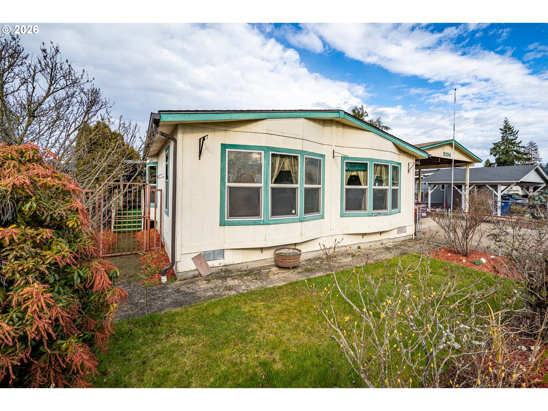 5254 Forsythia Street Springfield, OR 97478 - Photo 15 of 18 a house with trees in the background