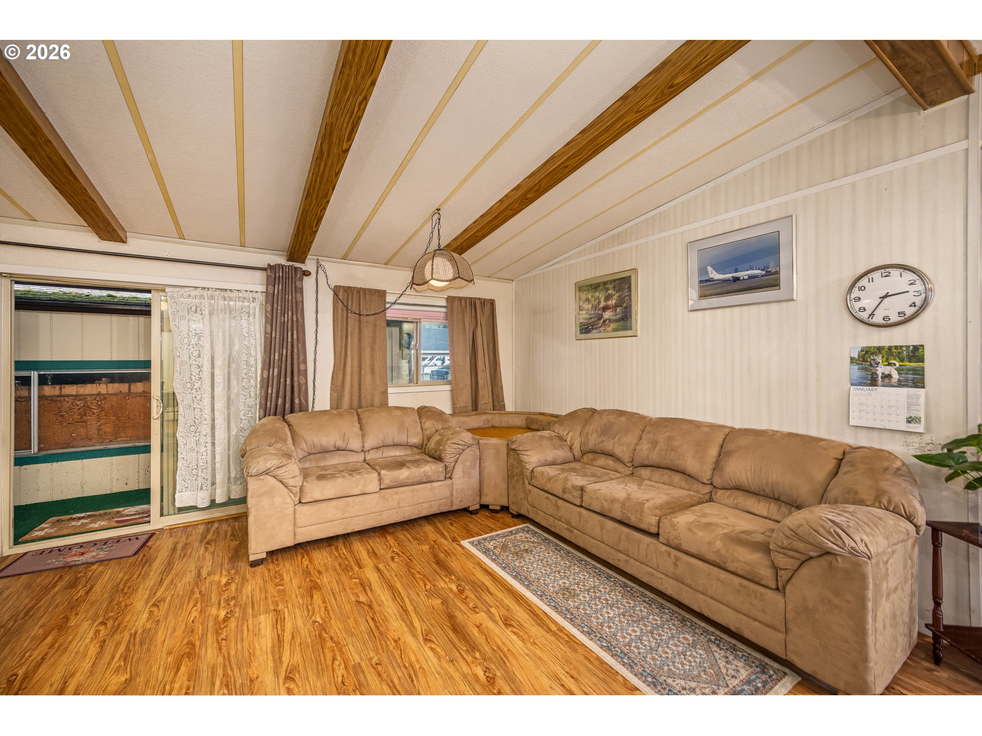 5254 Forsythia Street Springfield, OR 97478 - Photo 6 of 18 a living room with furniture and wooden floor