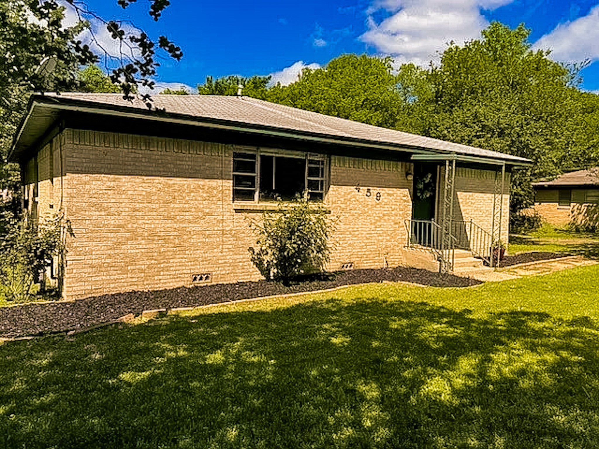 a front view of house with yard