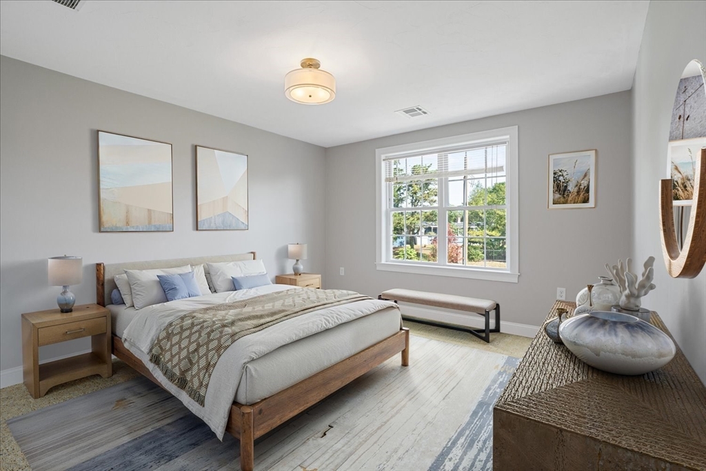 511 Mendon Road, Unit 511 Attleboro, MA 02703 - Photo 24 of 37 a bedroom with a bed and window