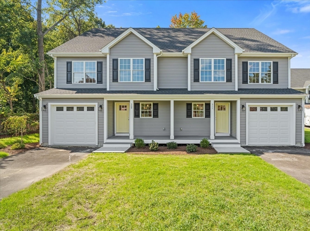 511 Mendon Road, Unit 511 Attleboro, MA 02703 - Photo 33 of 37 front view of a house with a yard