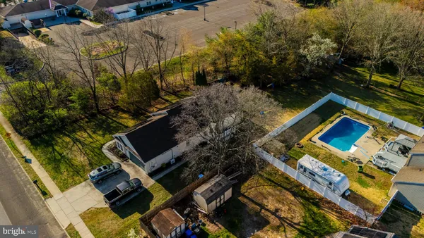 a bird view of water and yard