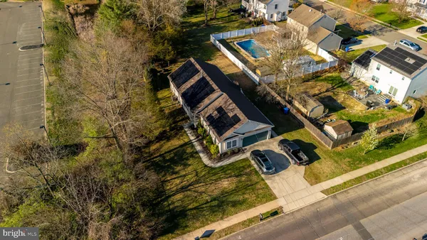 an aerial view of residential house with parking space
