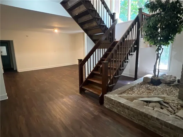 a view of entryway with wooden floor