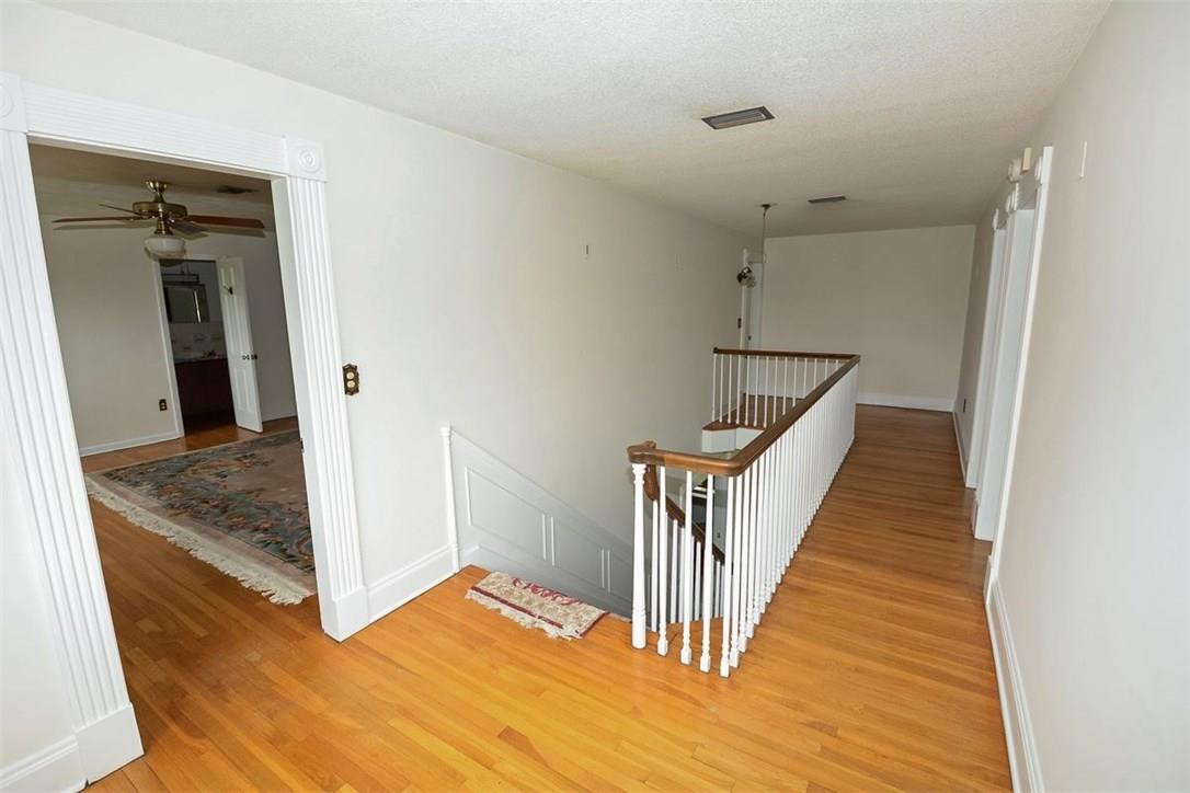 13851 Stirling Road Southwest Ranches, FL 33330 - Photo 12 of 33 a view of a hallway view with staircase
