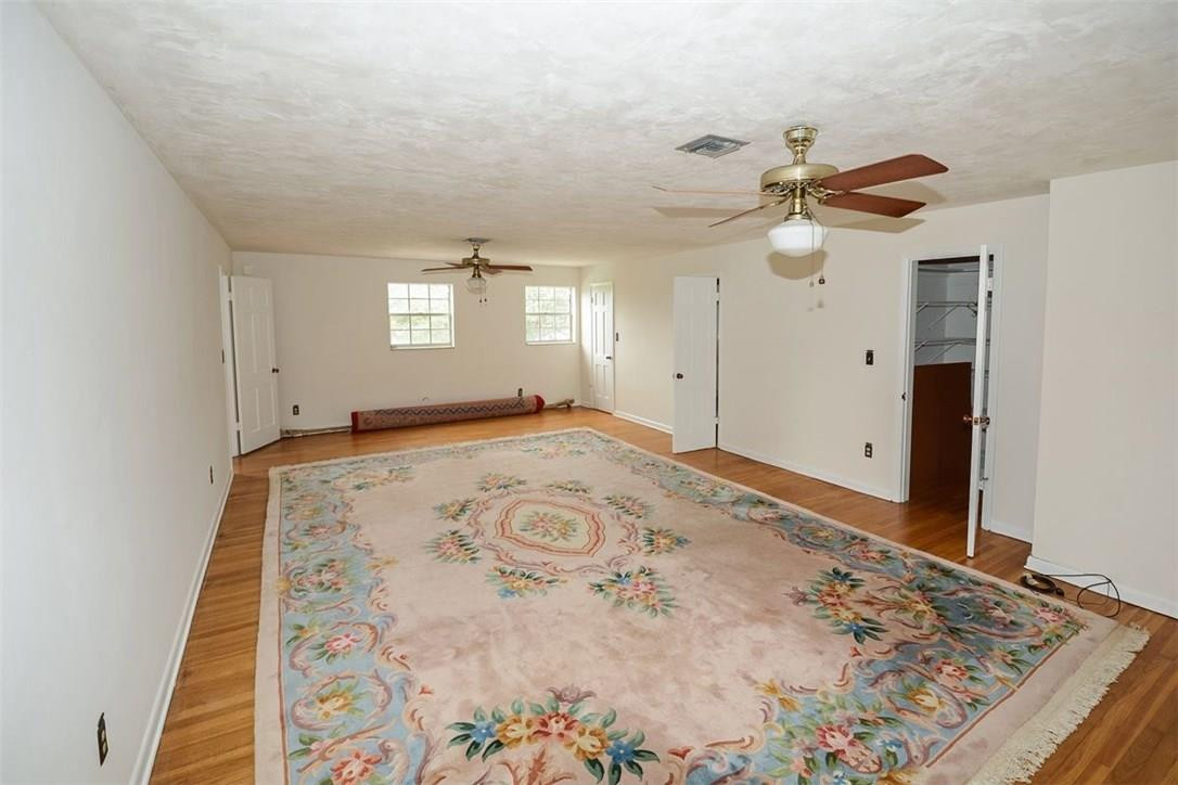 13851 Stirling Road Southwest Ranches, FL 33330 - Photo 18 of 33 a view of a room with a flat screen tv