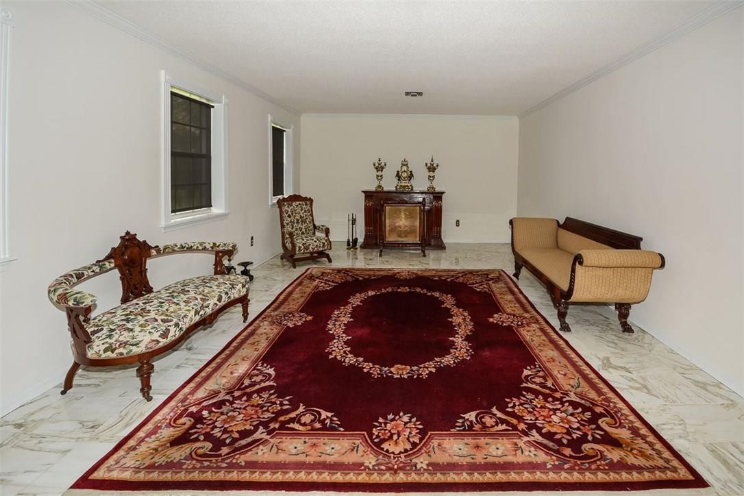 13851 Stirling Road Southwest Ranches, FL 33330 - Photo 19 of 33 a room with furniture and rug