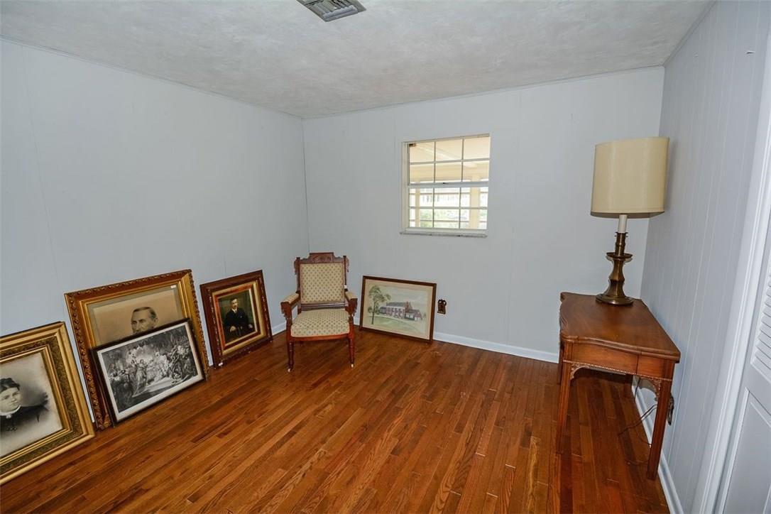 13851 Stirling Road Southwest Ranches, FL 33330 - Photo 24 of 33 a view of a livingroom with furniture and wooden floor