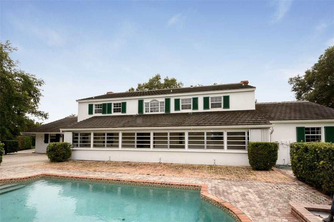 13851 Stirling Road Southwest Ranches, FL 33330 - Photo 9 of 33 a house with river in front of it