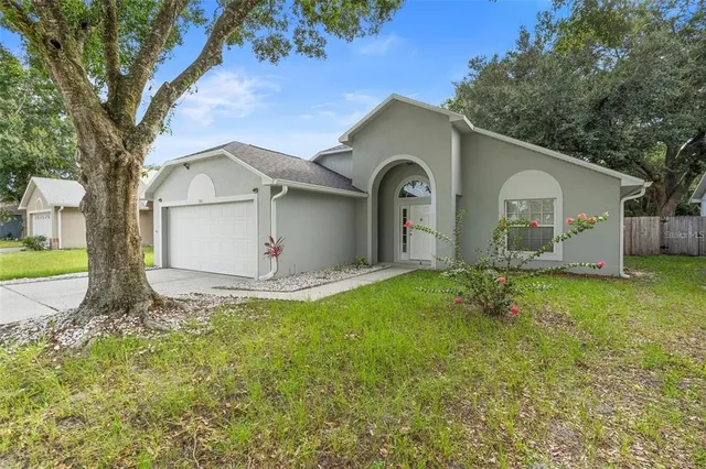 a house view with a garden space
