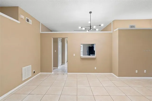 a kitchen with a sink a stove and refrigerator