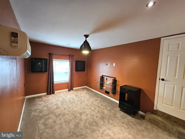 a view of livingroom with kitchen