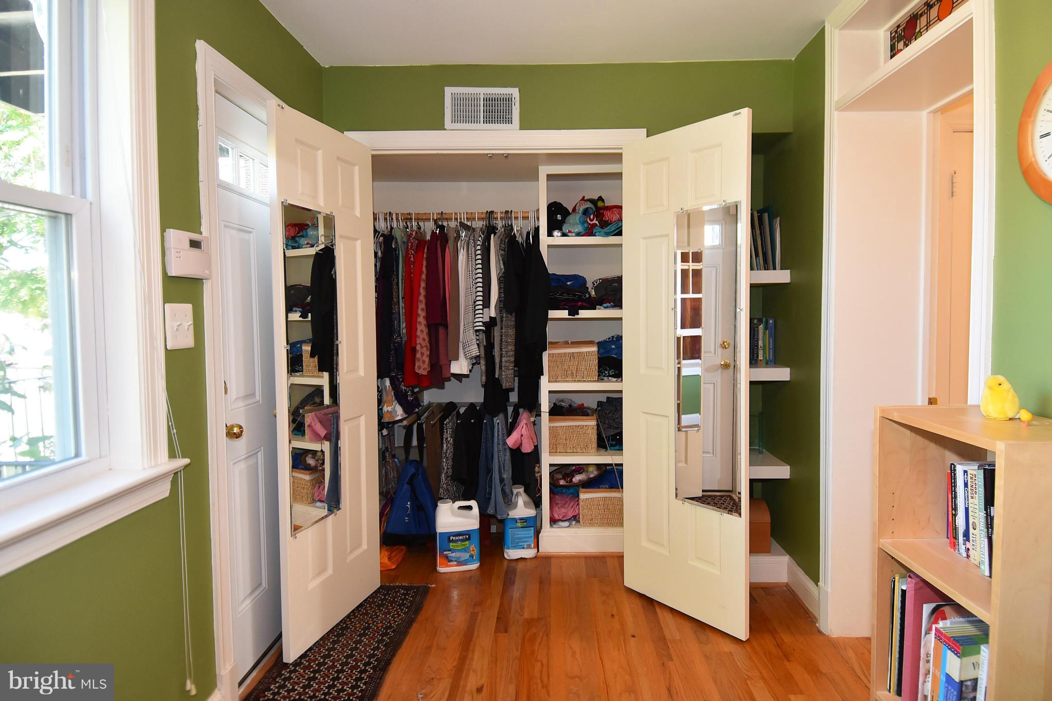 4010 Kansas Avenue Northwest, Unit 1 Washington, DC 20011 - Photo 15 of 28 a view of walk in closet with clothes and shoes