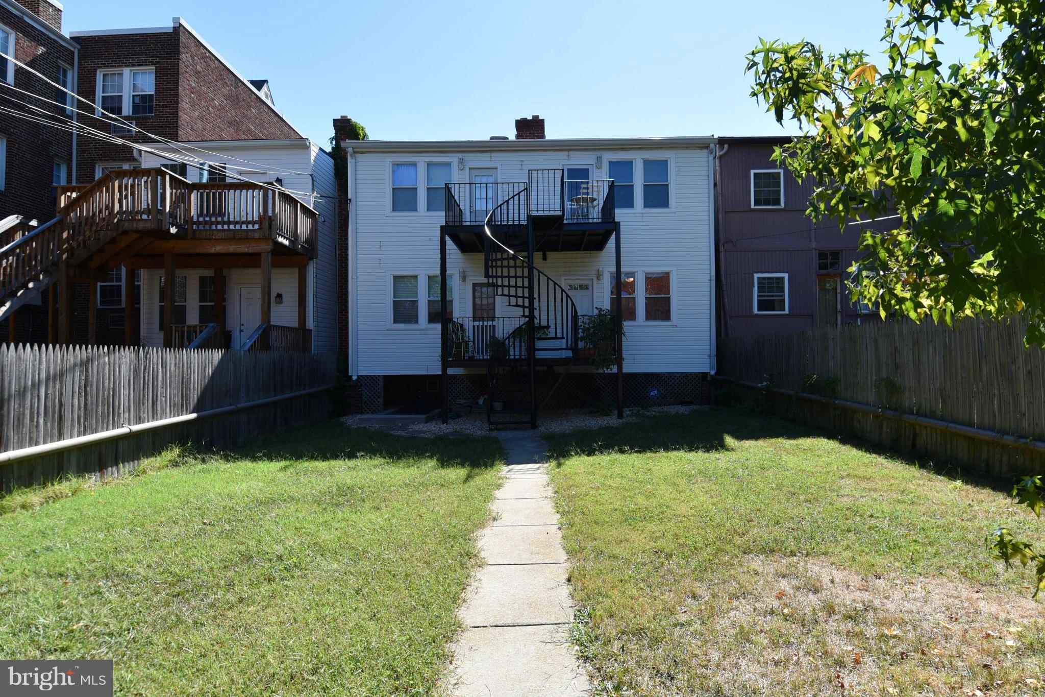 4010 Kansas Avenue Northwest, Unit 1 Washington, DC 20011 - Photo 20 of 28 a view of house with backyard and garden