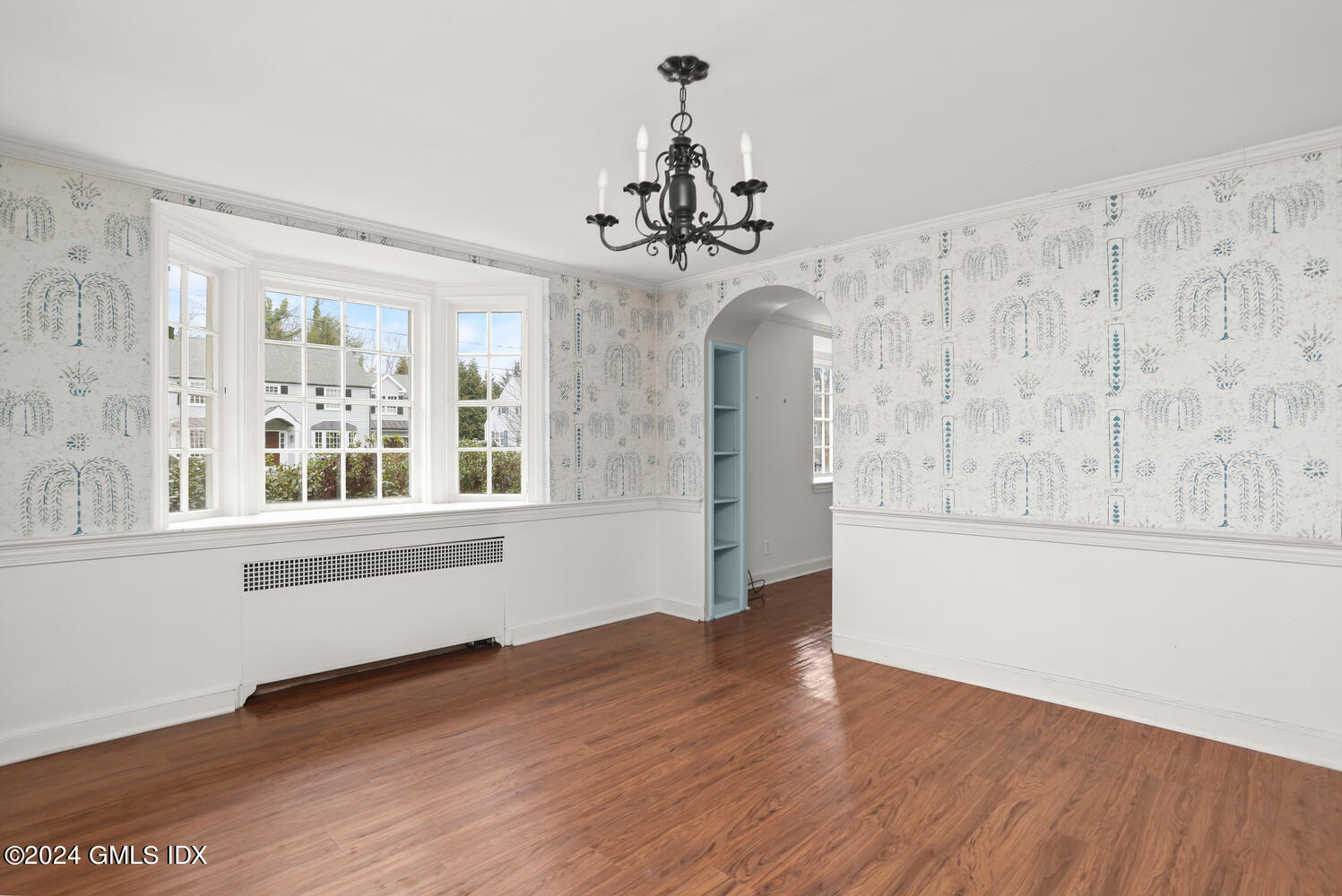 11 Field Road Riverside, CT 06878 - Photo 8 of 14 a view of an empty room with wooden floor and a window