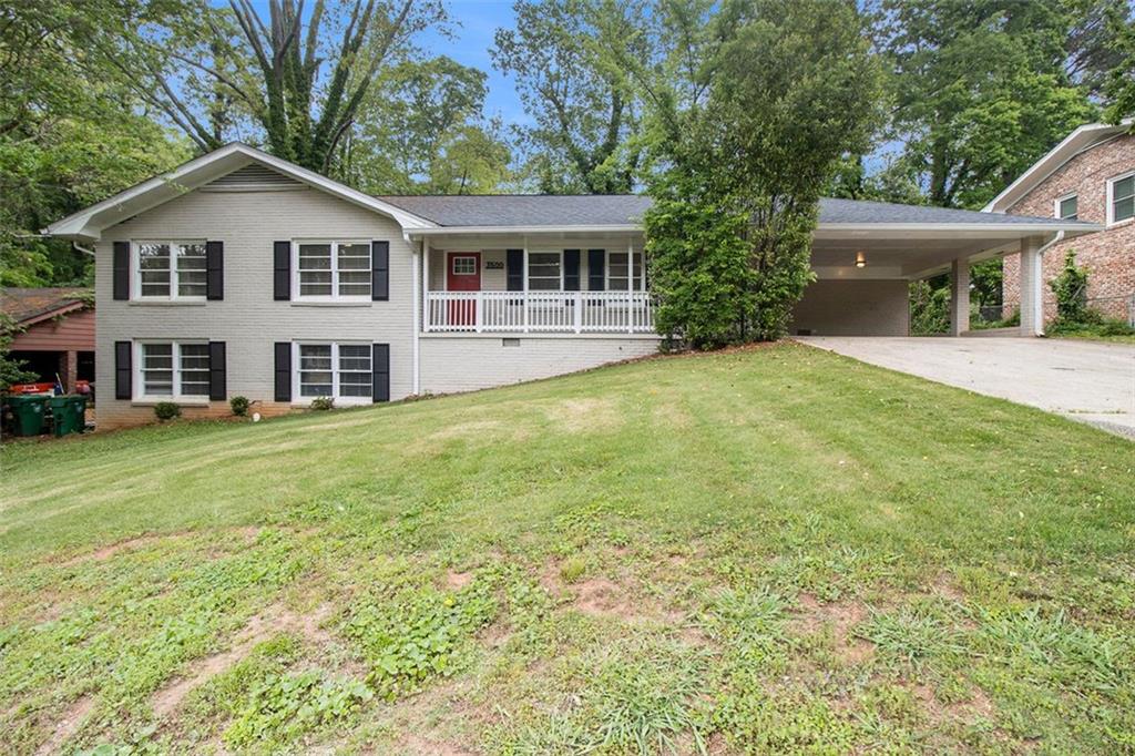3500 Finesse Drive Decatur, GA 30032 - Photo 1 of 1 a front view of a house with a garden