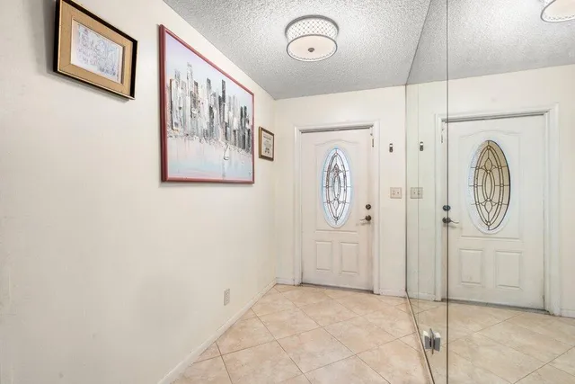 a view of a hallway with elevator