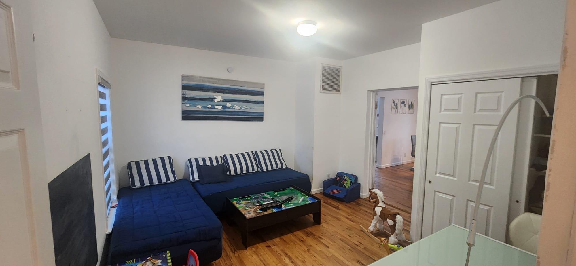 39 Washington Avenue East Hampton, NY 11937 - Photo 21 of 21 Living room featuring wood-type flooring