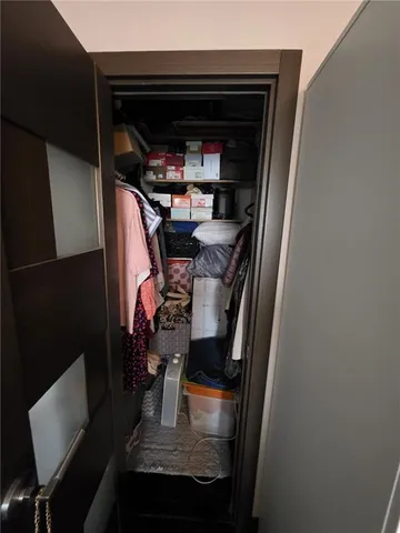 a view of parking garage with cars