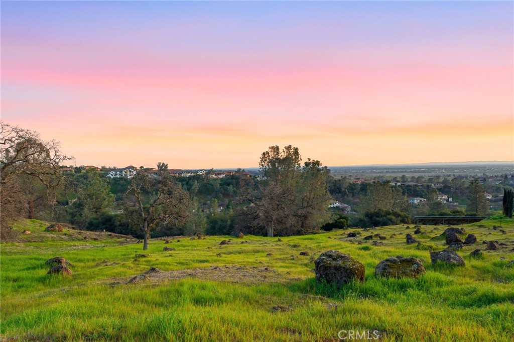 3309 Shadybrook Lane Chico, CA 95928 - Photo 5 of 13 a view of a grassy area with mountains and a mountain view