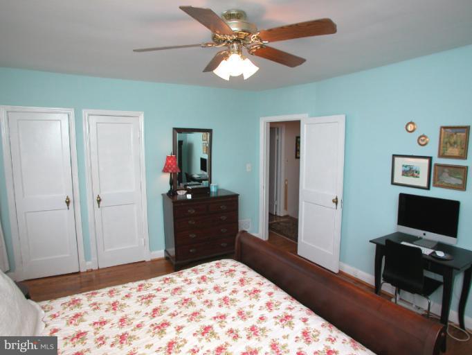 222 Gaywood Road Baltimore, MD 21212 - Photo 1 of 24 a bedroom with a bed and a dresser
