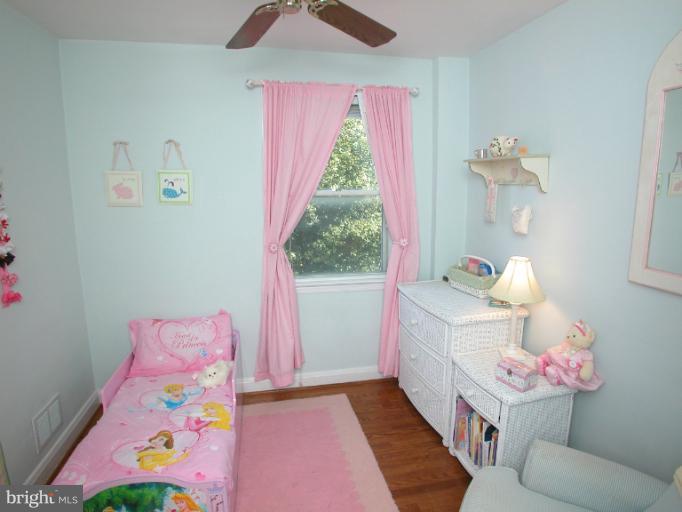 222 Gaywood Road Baltimore, MD 21212 - Photo 21 of 24 a bedroom with a bed and a window