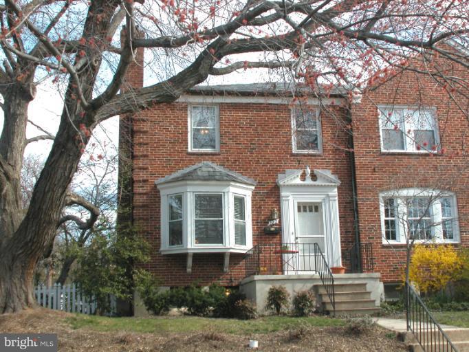 222 Gaywood Road Baltimore, MD 21212 - Photo 23 of 24 a front view of a house with a yard