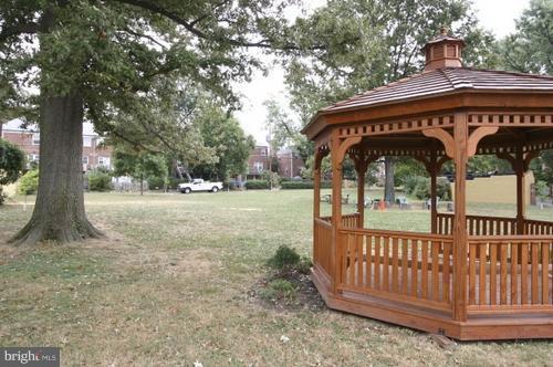 222 Gaywood Road Baltimore, MD 21212 - Photo 6 of 24 a view of a street with wooden fence