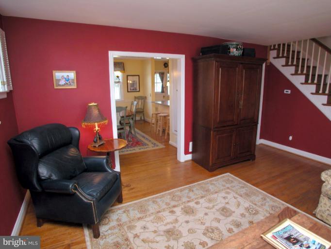 222 Gaywood Road Baltimore, MD 21212 - Photo 8 of 24 a living room with furniture and a rug