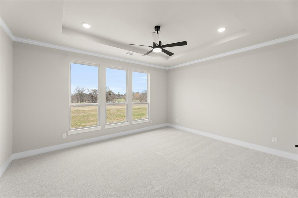 9916 Polo Pitch Lane Forney, TX 75126 - Photo 16 of 27 a view of an empty room with a window