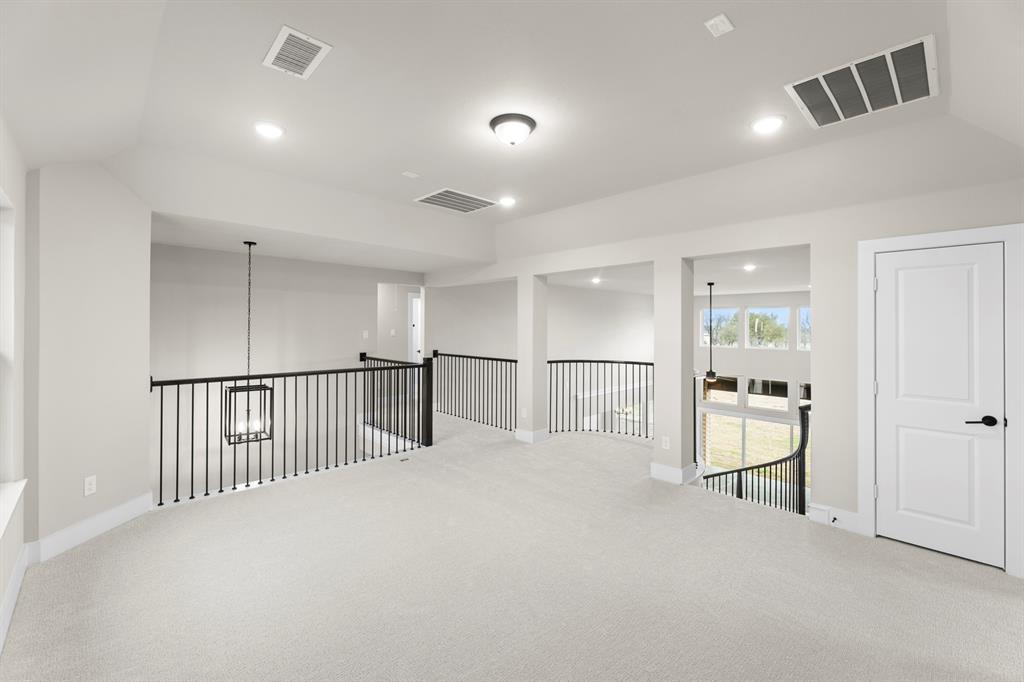 9916 Polo Pitch Lane Forney, TX 75126 - Photo 23 of 27 a view of an empty room