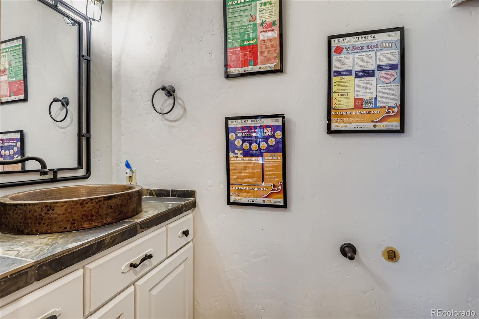 3033 Blake Street, Unit 109 Denver, CO 80205 - Photo 33 of 43 a bathroom with a granite countertop tub and a sink