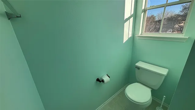 a bathroom with a sink a toilet and a tub