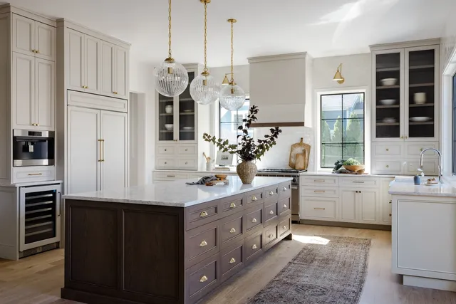 a kitchen with counter top space sink and stove