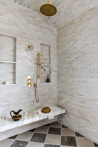 a bathroom with a sink and a shower