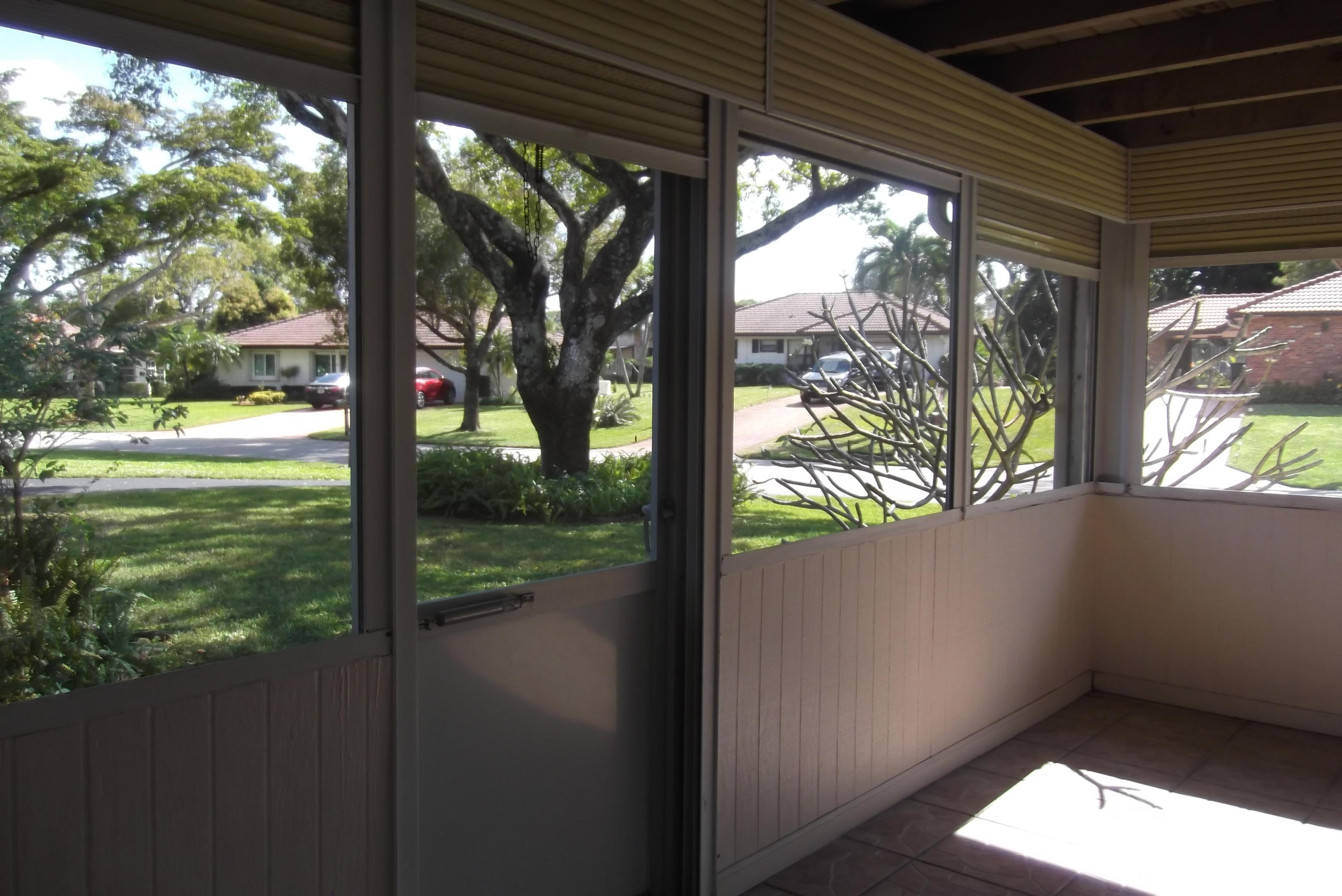313 Northwest 42nd Street Boca Raton, FL 33431 - Photo 17 of 24 Screened Porch