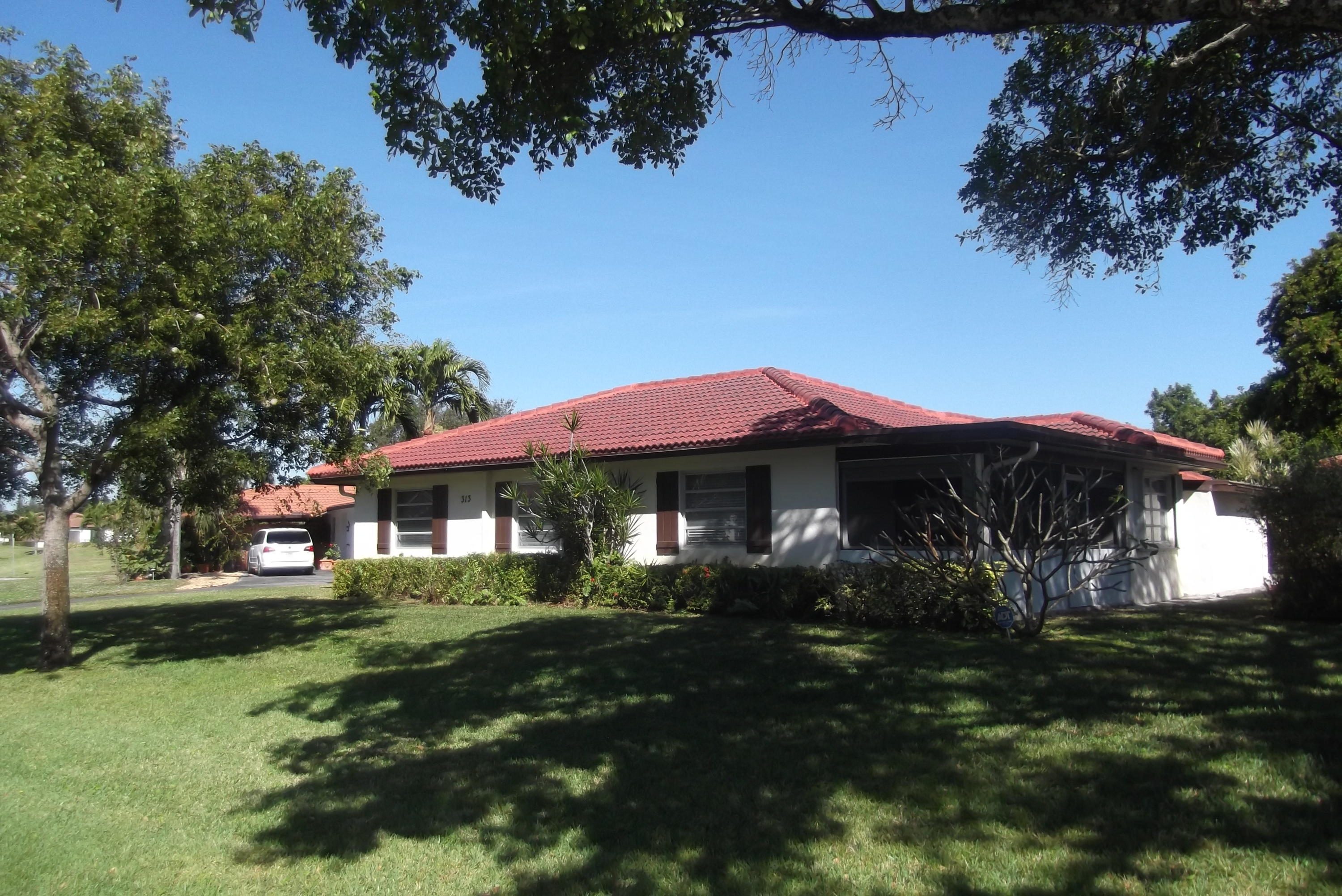 313 Northwest 42nd Street Boca Raton, FL 33431 - Photo 2 of 24 Rear Yard