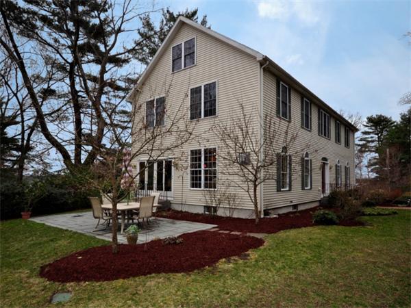 75 Ridgeway Avenue Needham, MA 02492 - Photo 1 of 22 a front view of a house with garden