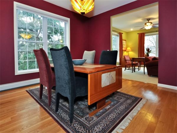 75 Ridgeway Avenue Needham, MA 02492 - Photo 15 of 22 a dining room with furniture a wooden floor and a floor to ceiling window