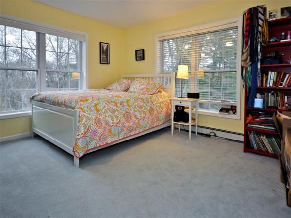 75 Ridgeway Avenue Needham, MA 02492 - Photo 21 of 22 a bed room with a bed and a book shelf