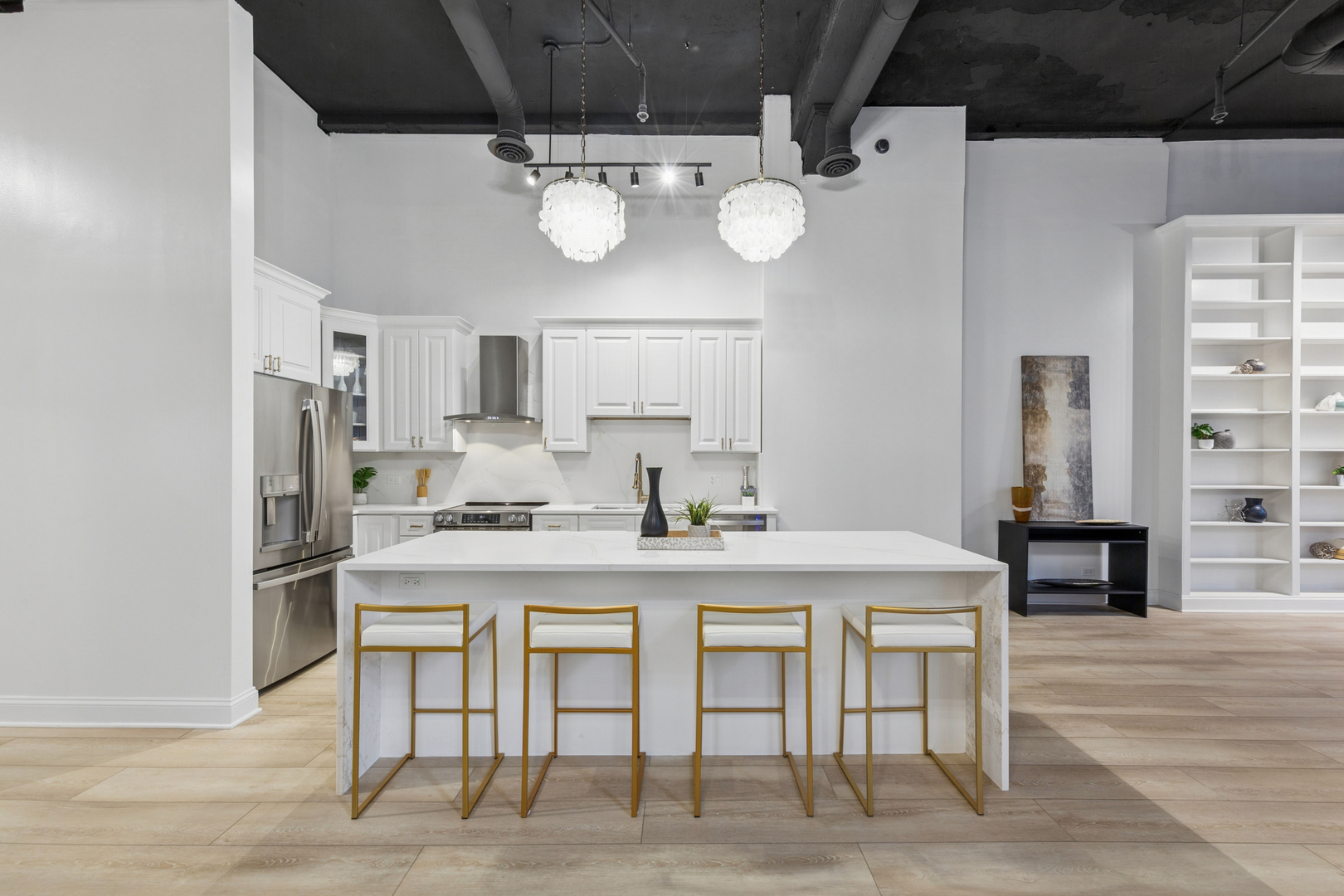 120 South State Street, Unit 4 Chicago, IL 60603 - Photo 6 of 28 a kitchen with a dining table and chairs