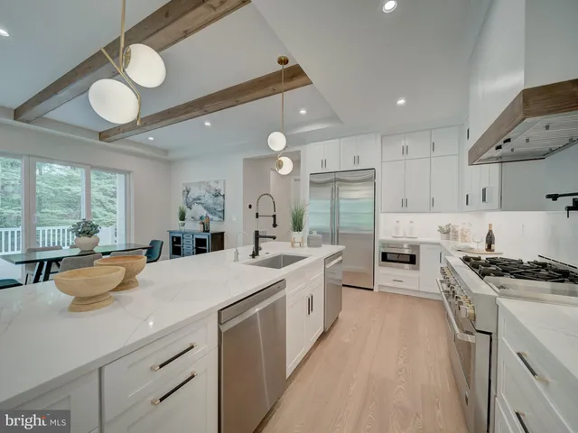 a kitchen with sink and window
